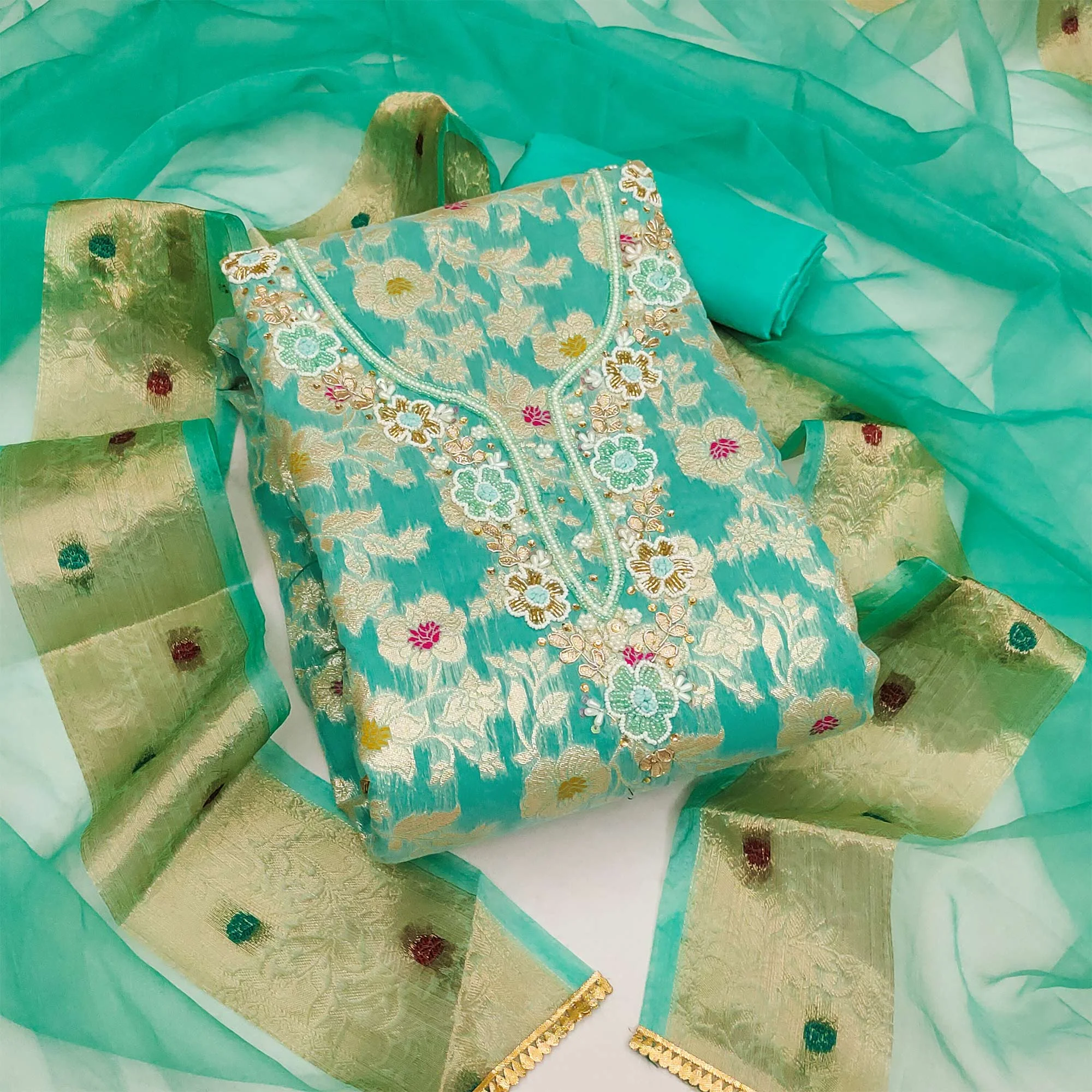 Turquoise Floral Woven With Hand Embroidery Muslin Dress Material